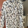 Camisa con estampado de serpiente